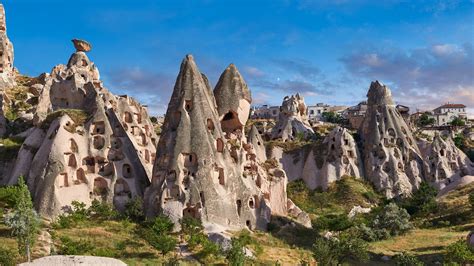 Cave houses in the rock formations near Goreme, Cappadocia, Turkey ...