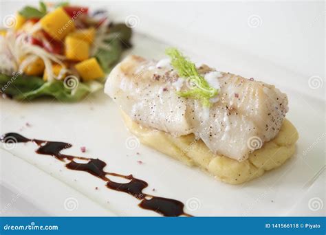 Grilled cod fish steak stock photo. Image of filet, plate - 141566118