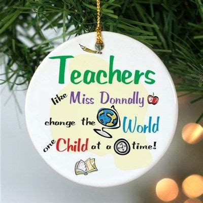 an ornament hanging from a christmas tree with teachers written on the front and back