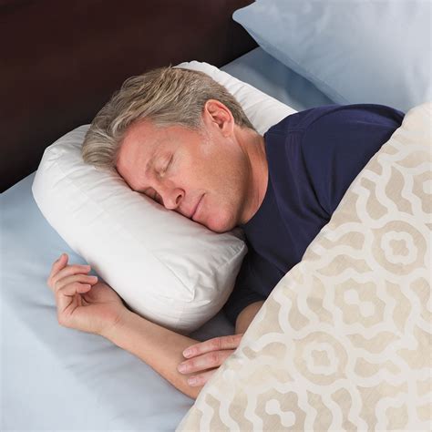 The Ergonomic Side Sleeper Pillow - Hammacher Schlemmer