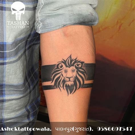 Lion Hand Band Tattoo | Band tattoo, Forearm band tattoos, Band tattoo ...