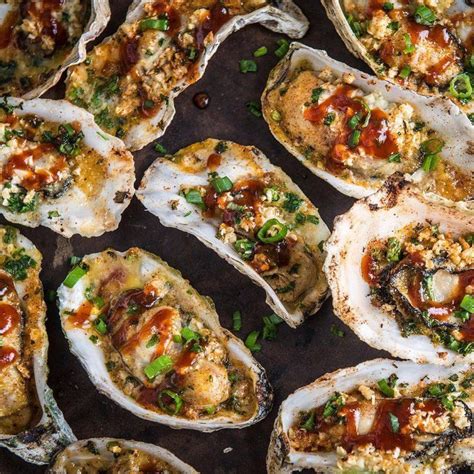 These BBQ oysters are shucked, sprinkled with breadcrumbs and garlic ...