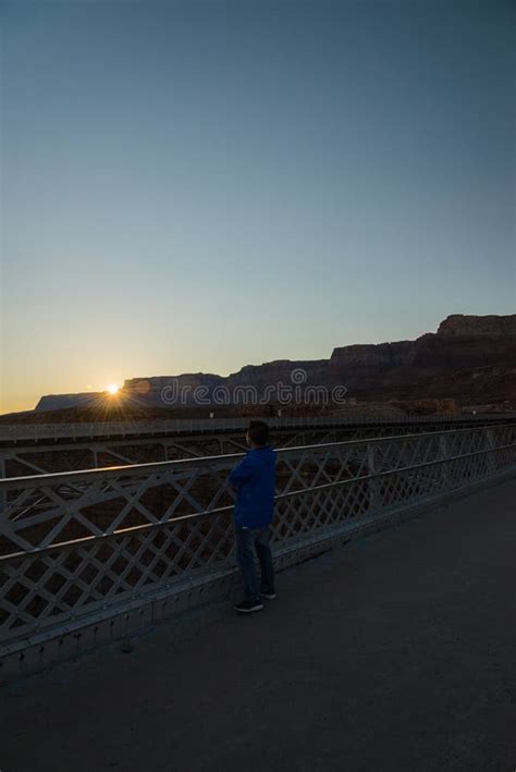 A Man See Sunset on the Navajo Bridge in Arizona USA Editorial Photography - Image of highway ...