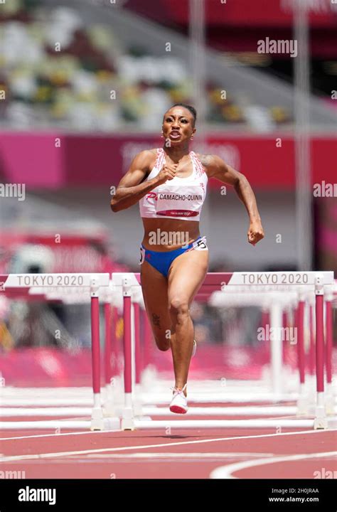 Jasmine Camacho-Quinn running and winning in the final of the 100 meter hurdles at the 2020 ...