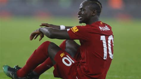 Liverpool suffer potentially huge injury blow during Wolves clash as Sadio Mane hobbles off ...