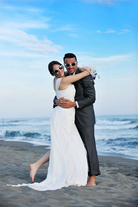 romantic beach wedding at sunset 12643247 Stock Photo at Vecteezy