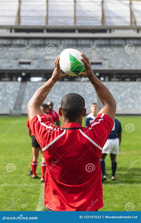 Male Rugby Player Throwing Rugby Ball in Stadium Stock Image - Image of ground, people: 152107533