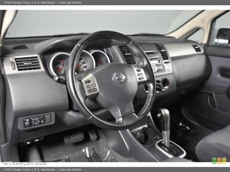 Charcoal Interior Dashboard for the 2009 Nissan Versa 1.8 SL Hatchback ...