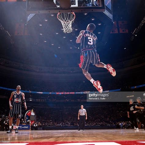 Steve Francis #3 of the Houston Rockets attempts a dunk during the 2002 Slam Dunk Contest on ...