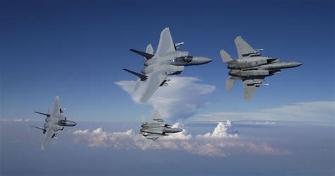 Oregon Air National Guard F-15 Eagles from the 173rd Fighter Wing fly over the wildland fires in ...