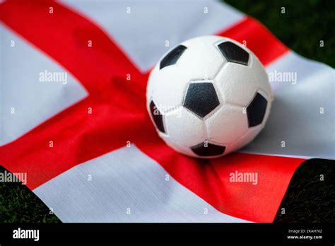 England national football team. National Flag on green grass and soccer ball. Football wallpaper ...