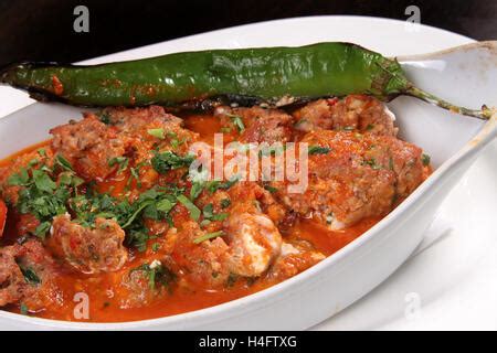 Lamb Beyti Kebab with tomato sauce Stock Photo - Alamy