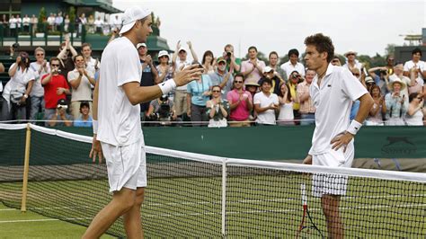 Download Epic Encounter: Nicolas Mahut vs. John Isner at Wimbledon Wallpaper | Wallpapers.com