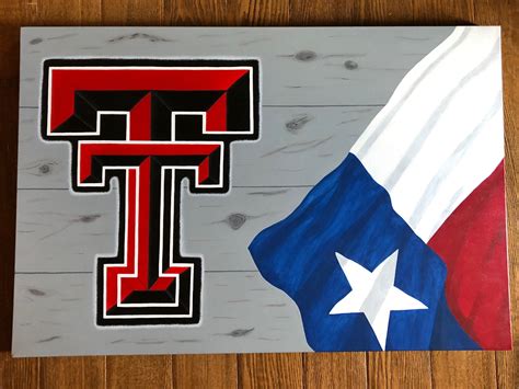 texas and texas tech painted on wood planks