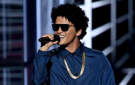 Bruno Mars impersonator charged for scamming woman out of $100,000