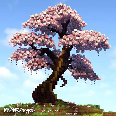 a tree with lots of pink flowers on it