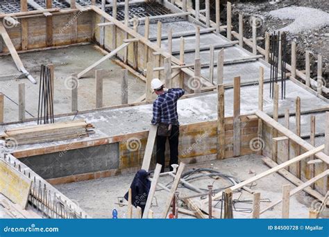 Carpenter at Work on Construction Site Editorial Stock Photo - Image of engineering, metal: 84500728