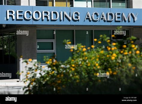 A logo sign outside of the headquarters of The Recording Academy in Santa Monica, California on ...