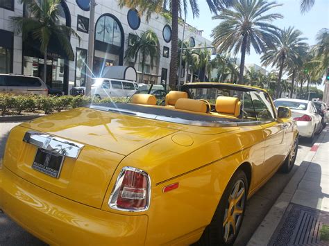 Yellow Rolls Royce on Rodeo Drive | bullcitydave | Flickr