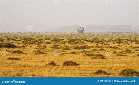 Hot Air Balloon Flight Ride, High View Flying Over Maasai Mara Landscape in Africa, Aerial Shot ...