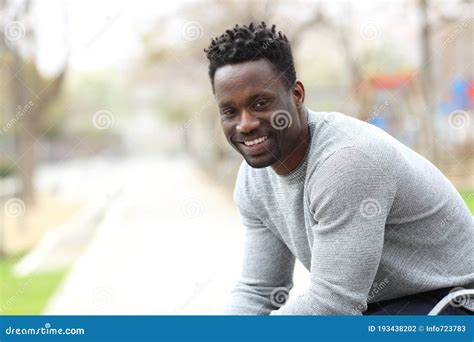 Happy Black Man Posing Looking at Camera on a Park Stock Photo - Image of ethnic, camera: 193438202