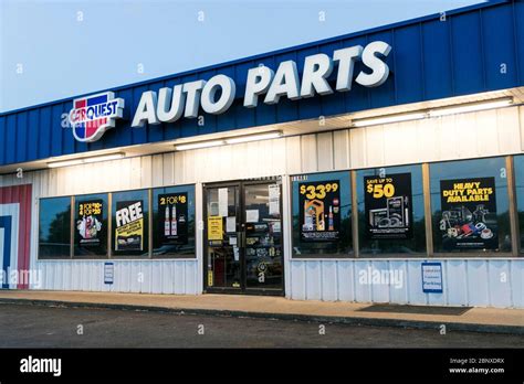 A logo sign outside of a Carquest Auto Parts retail store location in ...