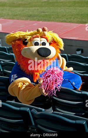 Orbit (Isotopes Baseball Team mascot) in stadium seats flashing No. 1 sign, Isotopes Park ...