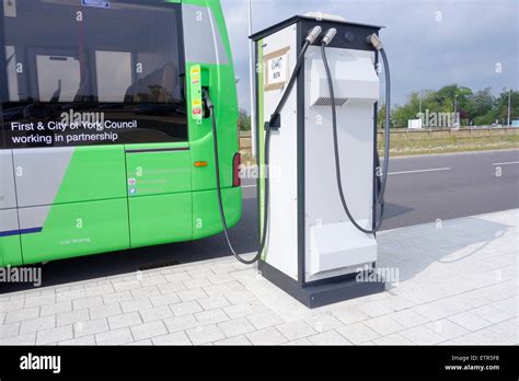 Electric bus charging station at Poppleton Bar Park and Ride, York, England, UK Stock Photo - Alamy