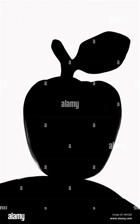 Black apple silhouette isolated on the white background Stock Photo - Alamy