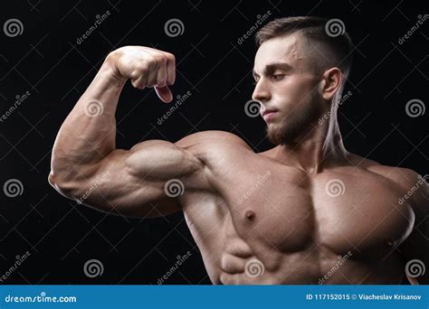 Handsome Power Athletic Man Bodybuilder Demonstrates His Biceps. Stock Image - Image of crossfit ...