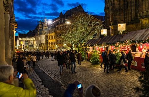 The famous Christkindlesmarkt of Nuremberg at night. - Pure Vacations