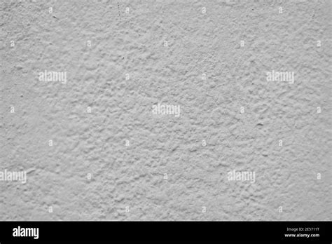 Light plastered wall with defects texture close up Stock Photo - Alamy
