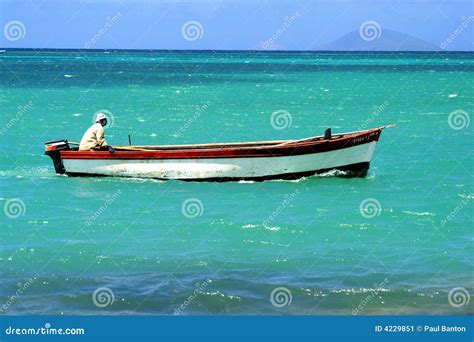 Fisherman In A Boat Stock Image - Image: 4229851