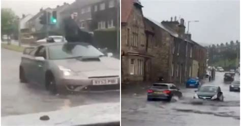 Edinburgh flooding: Video shows person stranded on car roof and vehicles struggling in the water ...