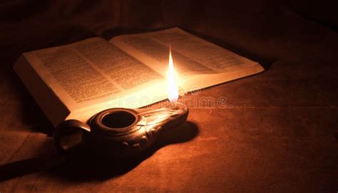 Oil lamp and Bible stock image. Image of open, light - 17103249