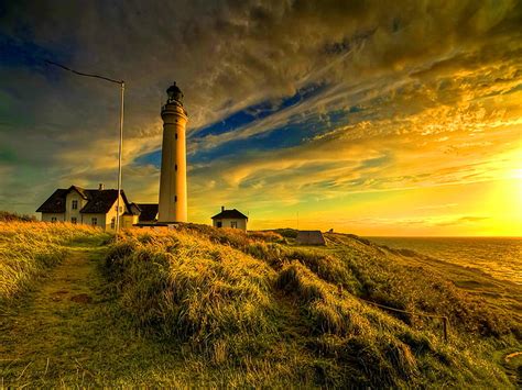 Lighthouse at sunrise, house, sun, golden, sunlight, yellow, sunset, sky, clouds, HD wallpaper ...