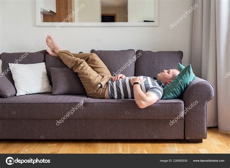 Man Sleeping Couch Stock Photo By Ekaterinaelagina 226592530