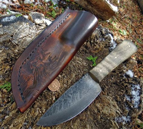 ML Knives Blog: A custom drop point knife with tooled Deer Sheath