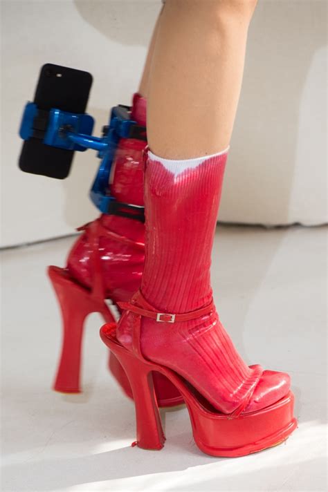 Maison Margiela’s Spring 2019 Show Included Boots With iPhone Holders ...