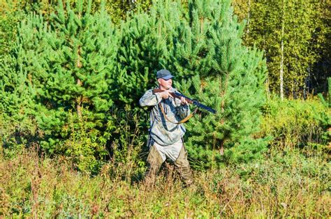 Hunter in the Summer Forest Stock Image - Image of activity, shelter ...