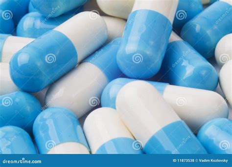 Blue and white capsules stock photo. Image of prescription - 11873538