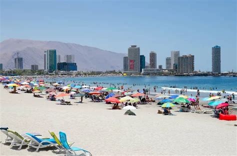 IQUIQUE, CHILE, 2017-01-18: city beach with people sunbathing and ...