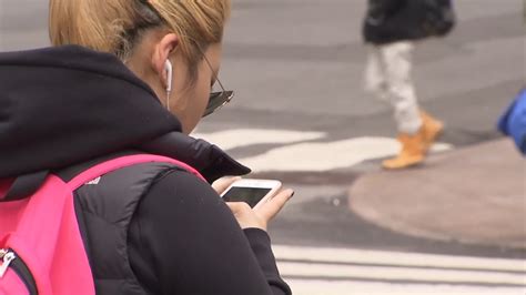 The dangers of distracted walking - CBS News