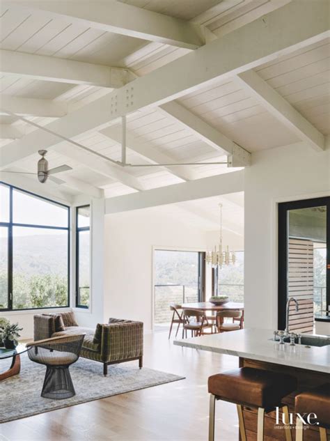 Beamed Ceiling White Living Room with Contemporary Furniture and Ceiling Fans | Midcentury home ...