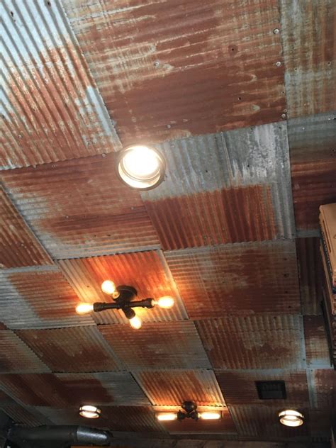 A majority rust tin ceiling installation | Rustic tin ceilings, Tin ceiling, Rustic tin