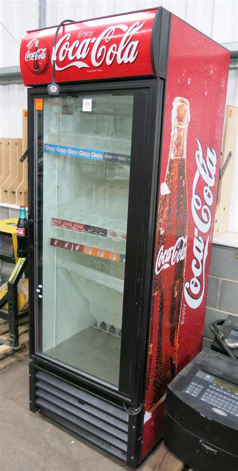 A Coca Cola display fridge. Please note there is a £5 + Lift Out Fee on this lot