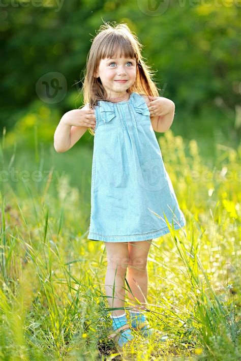 portrait of little girl outdoors in summer 865259 Stock Photo at Vecteezy