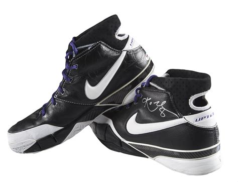 Lot Detail - Kobe Bryant Pair of Signed Black & Purple Nike Uptempo ...