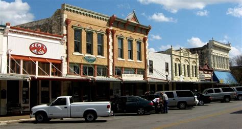 View of shops in downtown Georgetown TX | Downtown Georgetown TX | Pi…