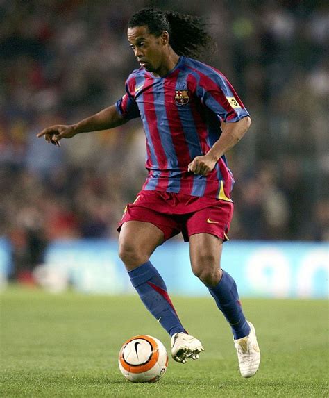 Ronaldinho of Barcelona brings the ball forward during the Primera ...